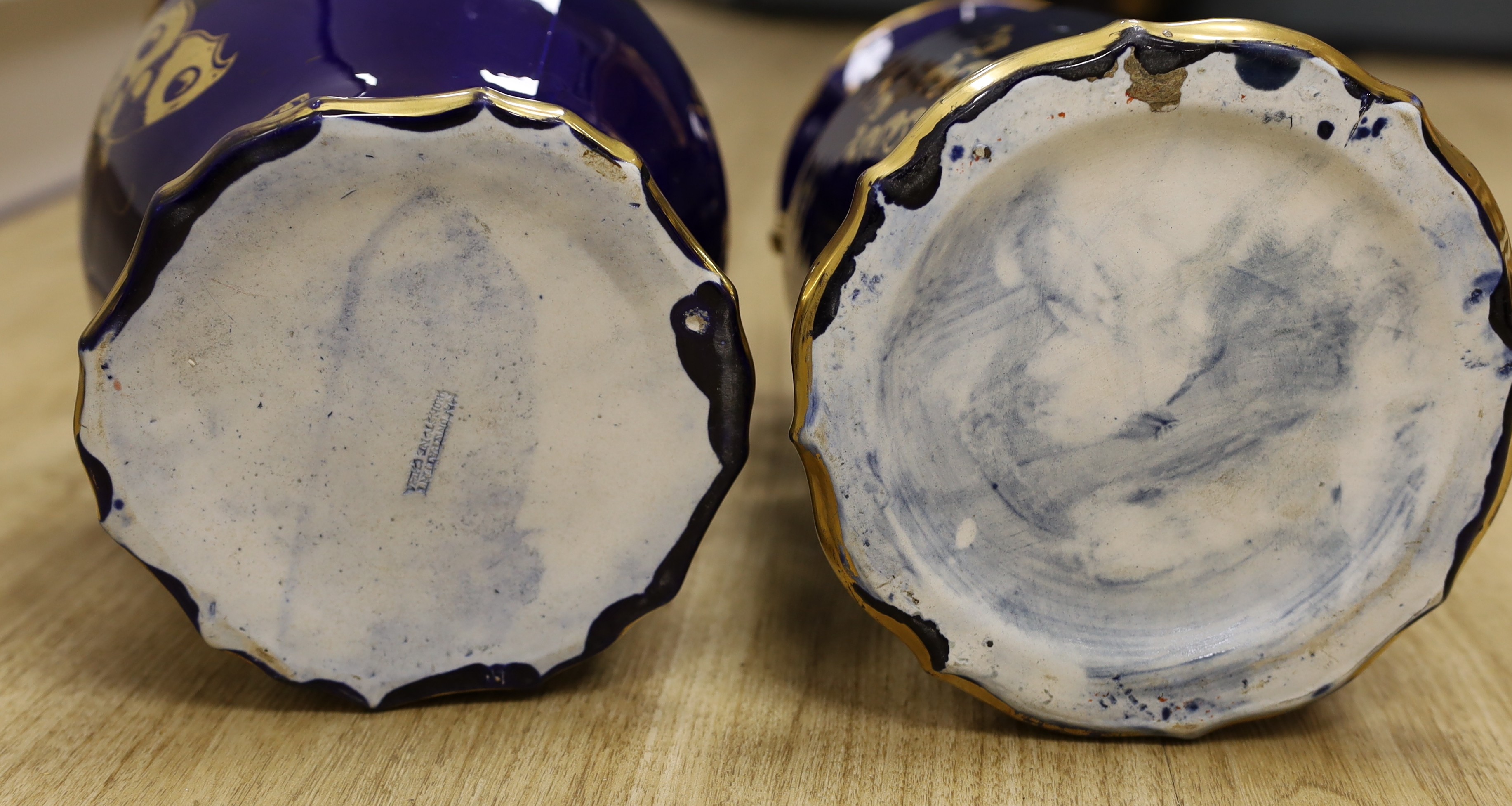 A large early 19th century Masons ironstone cobalt blue and gilt decorated jug and two similar large vases, tallest 37cms high